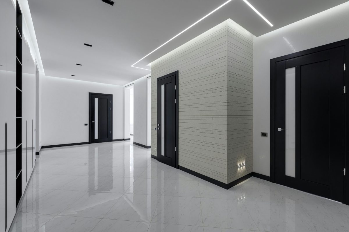 Modern hallway with sleek doors and finishes.